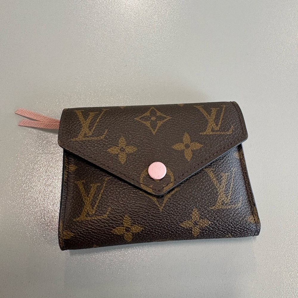 Authentic Louis Vuitton bifold monogram wallet with coin holder
